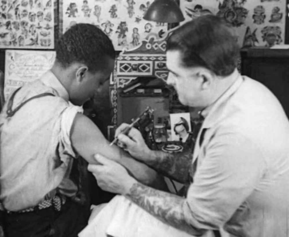 Mickey Kellet tattooing c. 1937 Chicago. 