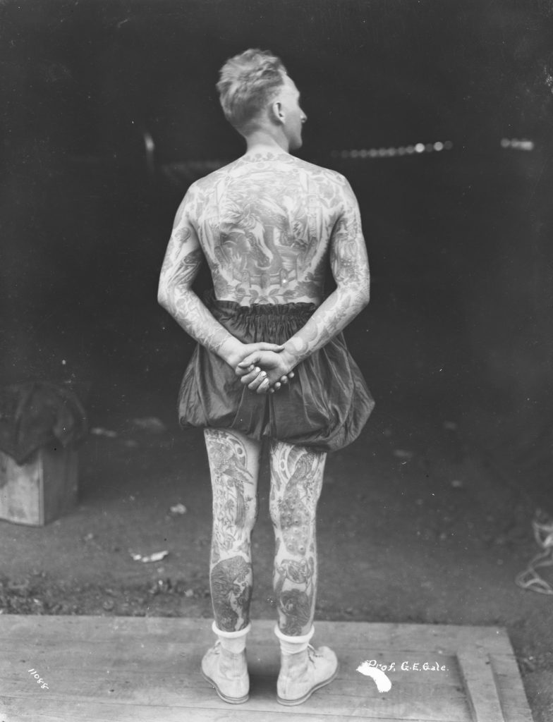 Tattoo Man, Prof. G.E. Gale, in circus in Breckenridge, 1922 [back view]